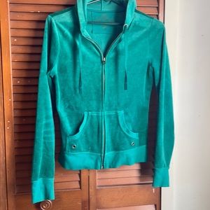 green zip up